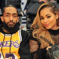 Nipsey Hussle and Lauren London at lakers game in 2017