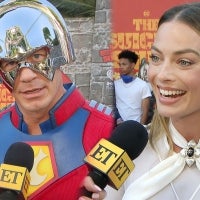 Margot Robbie Reacts to John Cena Dressing Up as Peacemaker for 'Suicide Squad' Premiere (Exclusive)