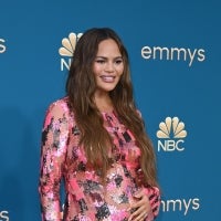 Chrissy Teigen arrives for the 74th Emmy Awards at the Microsoft Theater in Los Angeles, California, on September 12, 2022