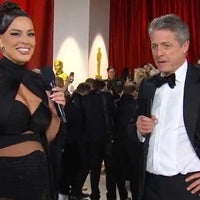 Ashley Graham and Hugh Grant