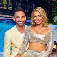 Carl Radke and Lindsay Hubbard pose at the season 7 reunion for Bravo's Summer House