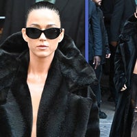 Katy Perry Wears Only a Fur Coat and Tights to Paris Fashion Week Show