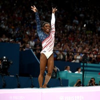 Simone Biles of Team United States reacts after competing on the vault during the Artistic Gymnastics Women's Team Final on day four of the Olympic Games Paris 2024 at Bercy Arena on July 30, 2024 in Paris, France.