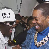 Watch Flavor Flav Lose It When He Sees 'Rap God' Busta Rhymes at VMAs Backstage (Exclusive)