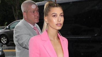 Rainy Weather Doesn't Stop Hailey Baldwin From Rocking a Pink Power Suit