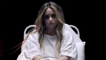 Demi Lovato Screams From Her Hospital Bed in 'Dancing With the Devil' Music Video