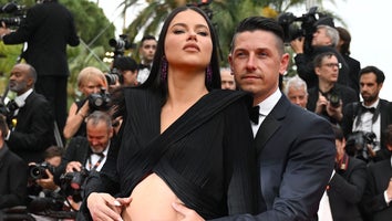 Adriana Lima Bares Baby Bump on Cannes Red Carpet in Cut-Out Gown You Have to See for Yourself