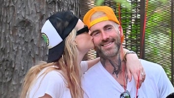 Behati Prinsloo and Adam Levine Celebrate His 44th Birthday at Disneyland With Sweet PDA