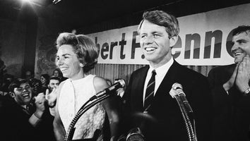 An exuberant Robert F. Kennedy addresses an enthusiastic throng at campaign headquarters after Indiana primary election victory. At left is Kennedy's wife Ethel.