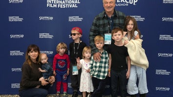 Alec and Hilaria Baldwin joined by kids on red carpet