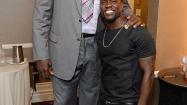 kevin hart and shaq standing next to each other