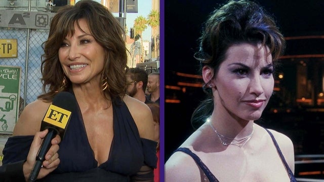 Gina Gershon REACTS to 'Showgirls' 30th Anniversary (Exclusive)