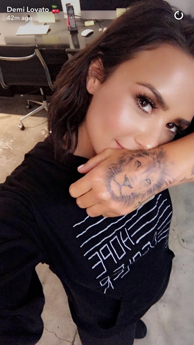 Demi Lovato Gets A Giant Lion Tattooed On Her Hand See The New Ink Entertainment Tonight
