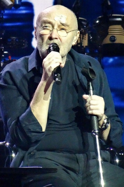 Phil Collins Returns to Stage With Bandage on Head After Being ...