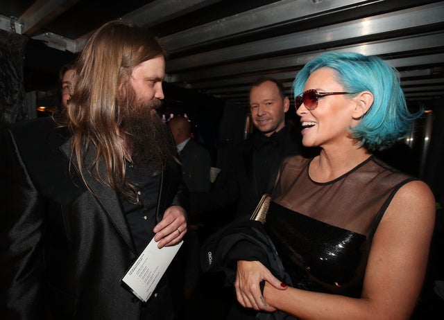 Chris Stapleton and Jenny McCarthy at 2018 GRAMMYs