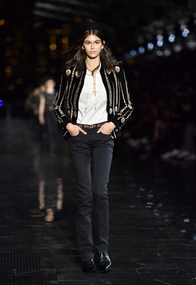 Kaia Gerber walks in Saint Laurent Men's show