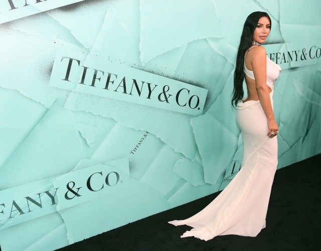 Kim Kardashian Flaunts Her Hourglass Frame, Frosts Herself With