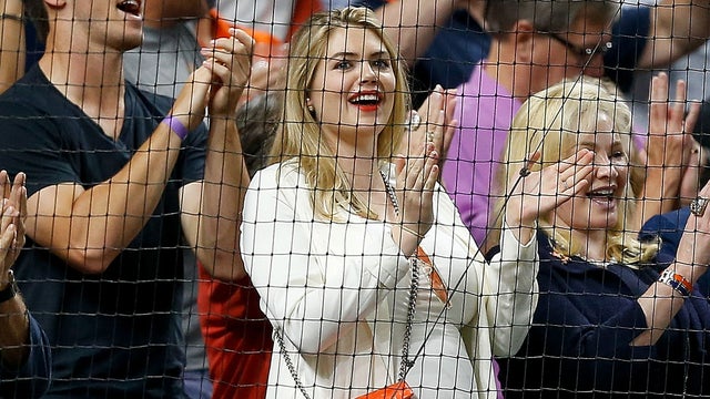 HOUSTON, TX - SEPTEMBER 22: Kate Upton holding her baby daughter Genevieve  Upton Verlander on the field after a baseball between the Houston Astros  and the Los Angeles Angels on September, 22