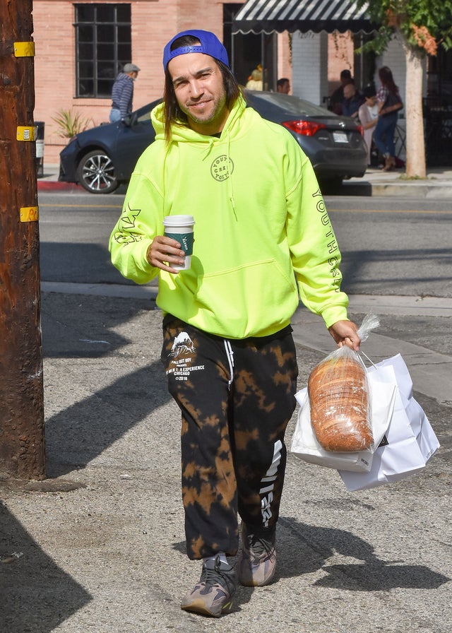 Pete Wentz in neon yellow hoodie