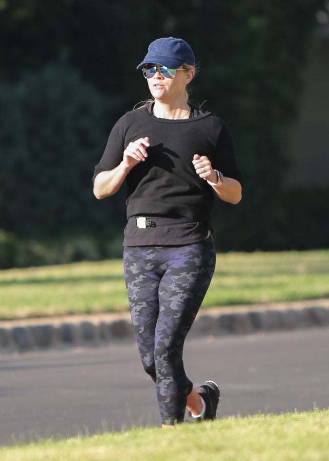 Reese Witherspoon jogs in Los Angeles