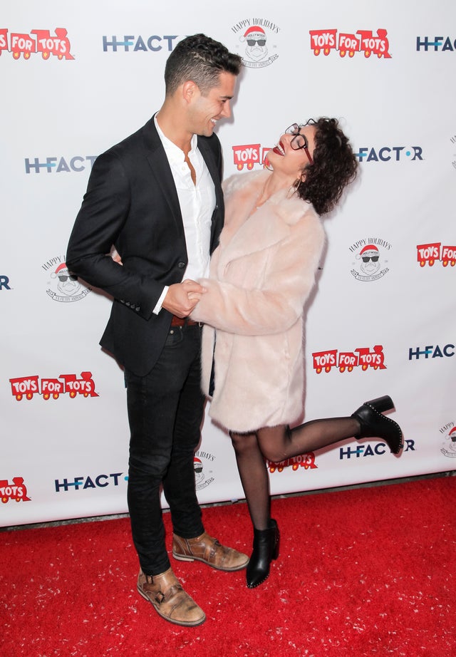 Wells Adams and Sarah Hyland at 6th annual Winter Wonderland Toys for Tots Party 