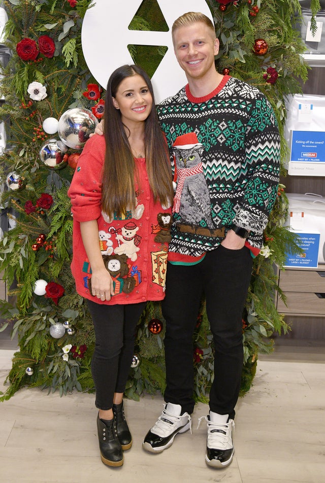 Sean and Catherine Lowe in holiday sweaters