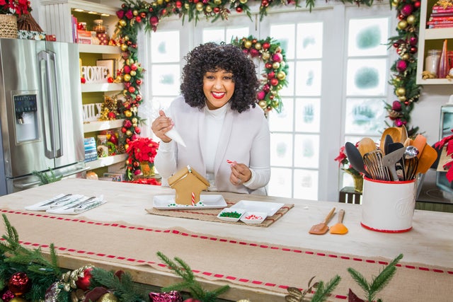 Tia Mowry builds a gingerbread house