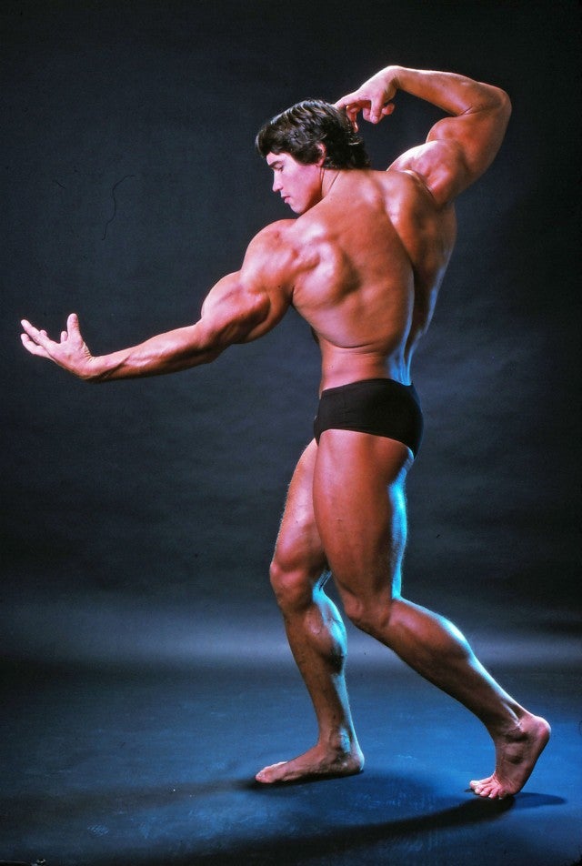 Body Builder Performing Front Double Biceps Poses Stock Photo, Picture and  Royalty Free Image. Image 27955083.