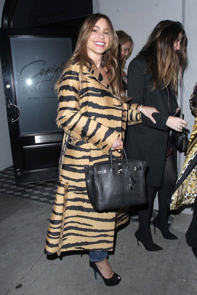 Sofia Vergara at Craig's in tiger-print coat