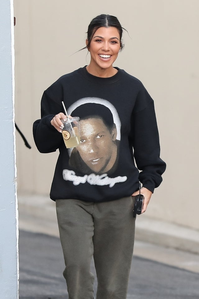 Kourtney Karashian in denzel washington sweatshirt