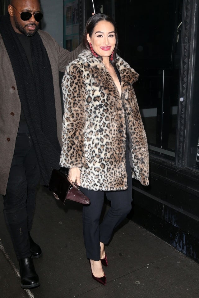 Brie Bella in leopard print coat
