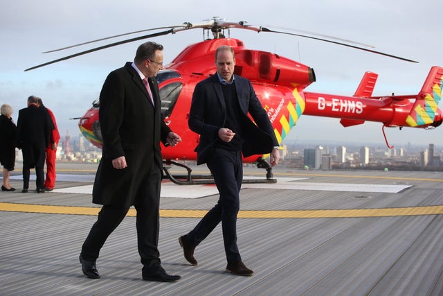 Prince William arrives at The Royal London Hospital by helicopter