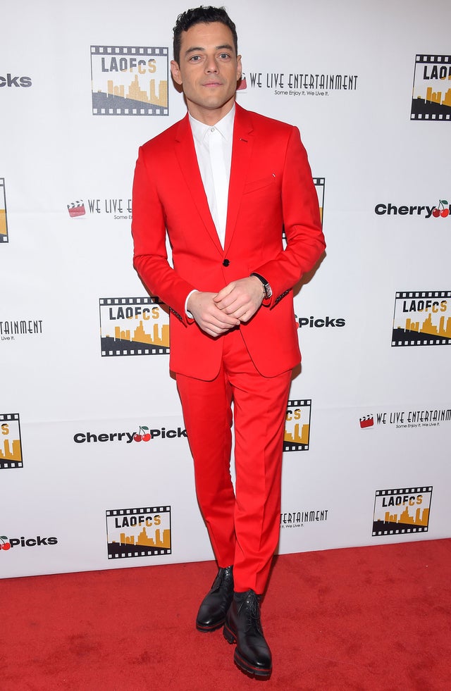 Rami Malek in red suit