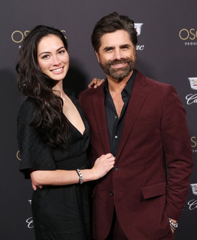 Caitlin McHugh and John Stamos at oscars event