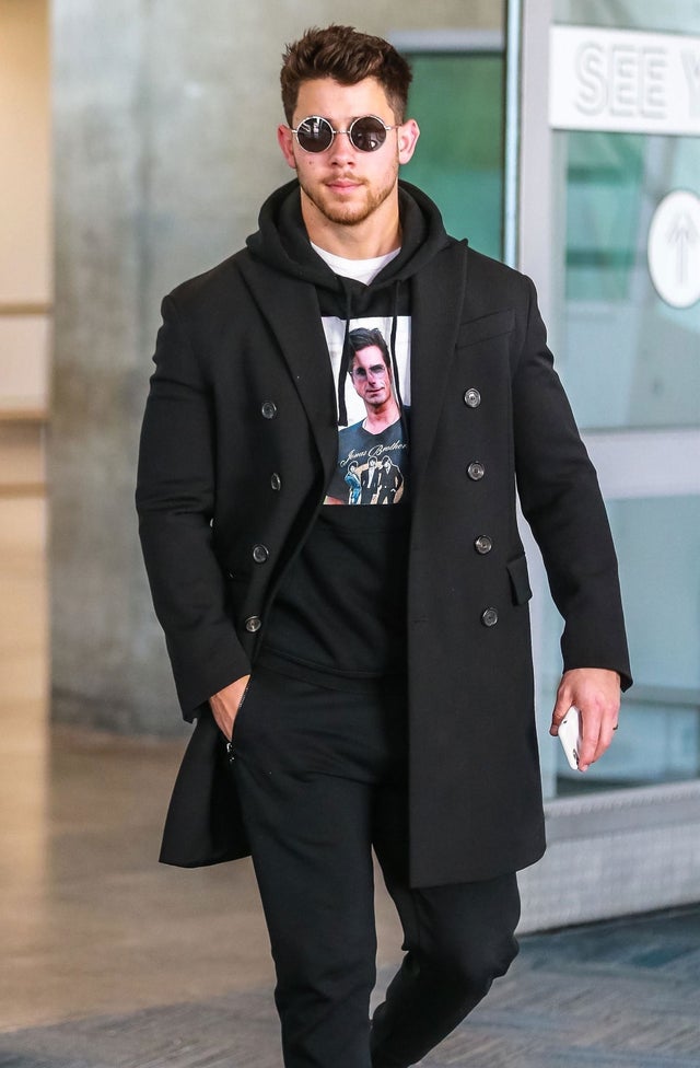 Nick Jonas in john stamos shirt