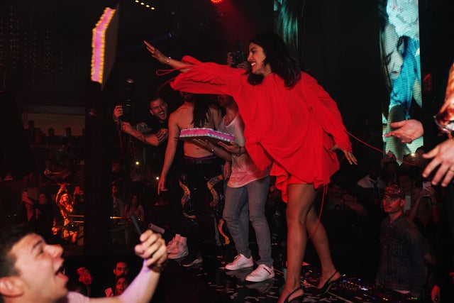 Priyanka Chopra throwing cake with steven aoki