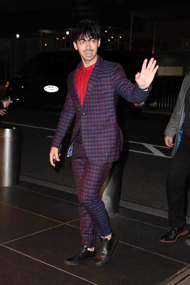 Joe Jonas in plaid suit at his NYC hotel on april 2