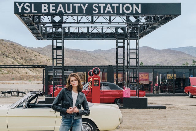 Kaia Gerber at Coachella YSL beauty station