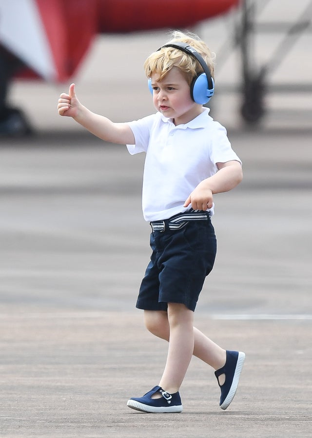 Prince George of Cambridge gives a thumbs up at The Royal International Air Tattoo at RAF Fairford in 2016