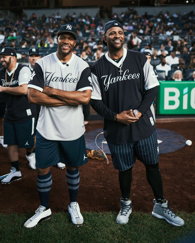 Michael Strahan and CC Sabathia at charity baseball game