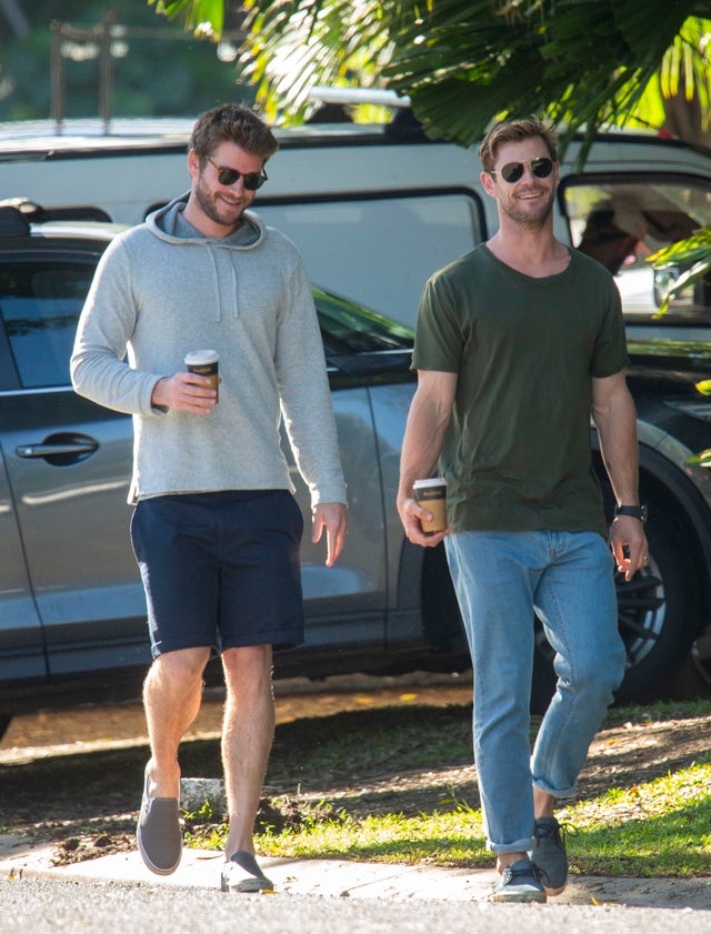 Liam Hemsworth and Chris Hemsworth in Byron Bay