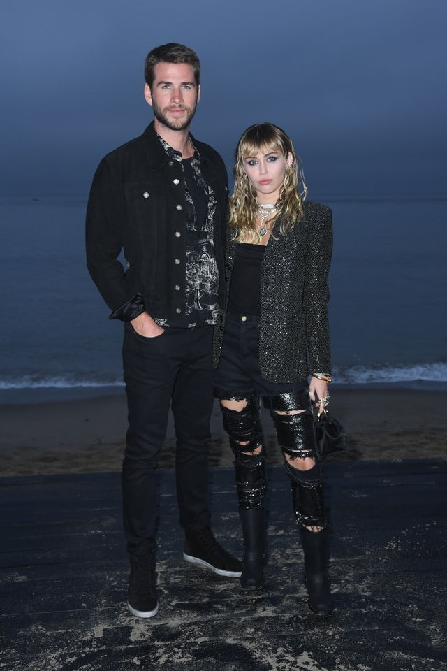 Liam Hemsworth and Miley Cyrus at Saint Laurent Men's Spring-Summer 2020 show