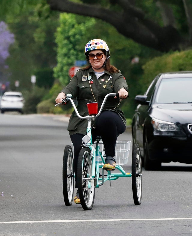 Melissa McCarthy rides a bike in LA on june 18
