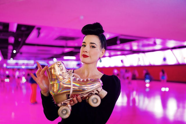 Dita Von Teese with rollerskate