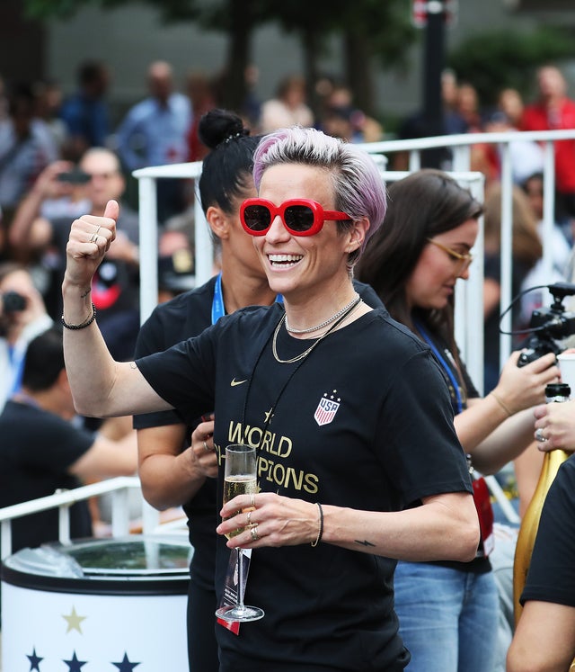 Megan Rapinoe thumbs up at parade