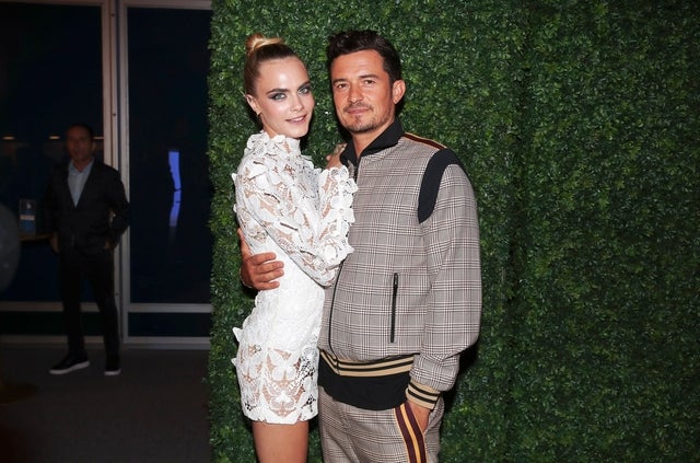 Cara Delevingne and Orlando Bloom at carnival party during comic-con