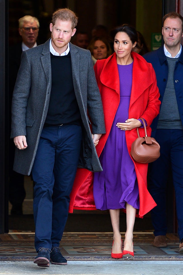 Meghan Markle in red and purple outfit