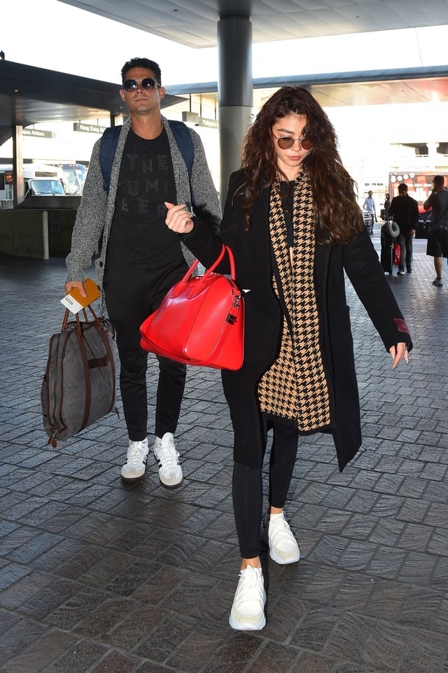 Wells Adams and Sarah Hyland at LAX