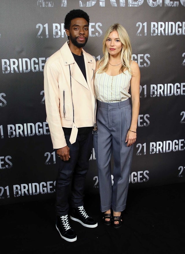 Chadwick Boseman and Sienna Miller at a photocall for STX Entertainment's "21 Bridges" 