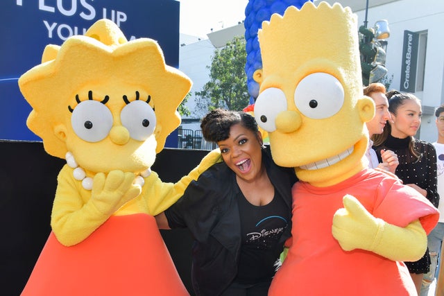 Yvette Nicole Brown with bart and lisa simpson